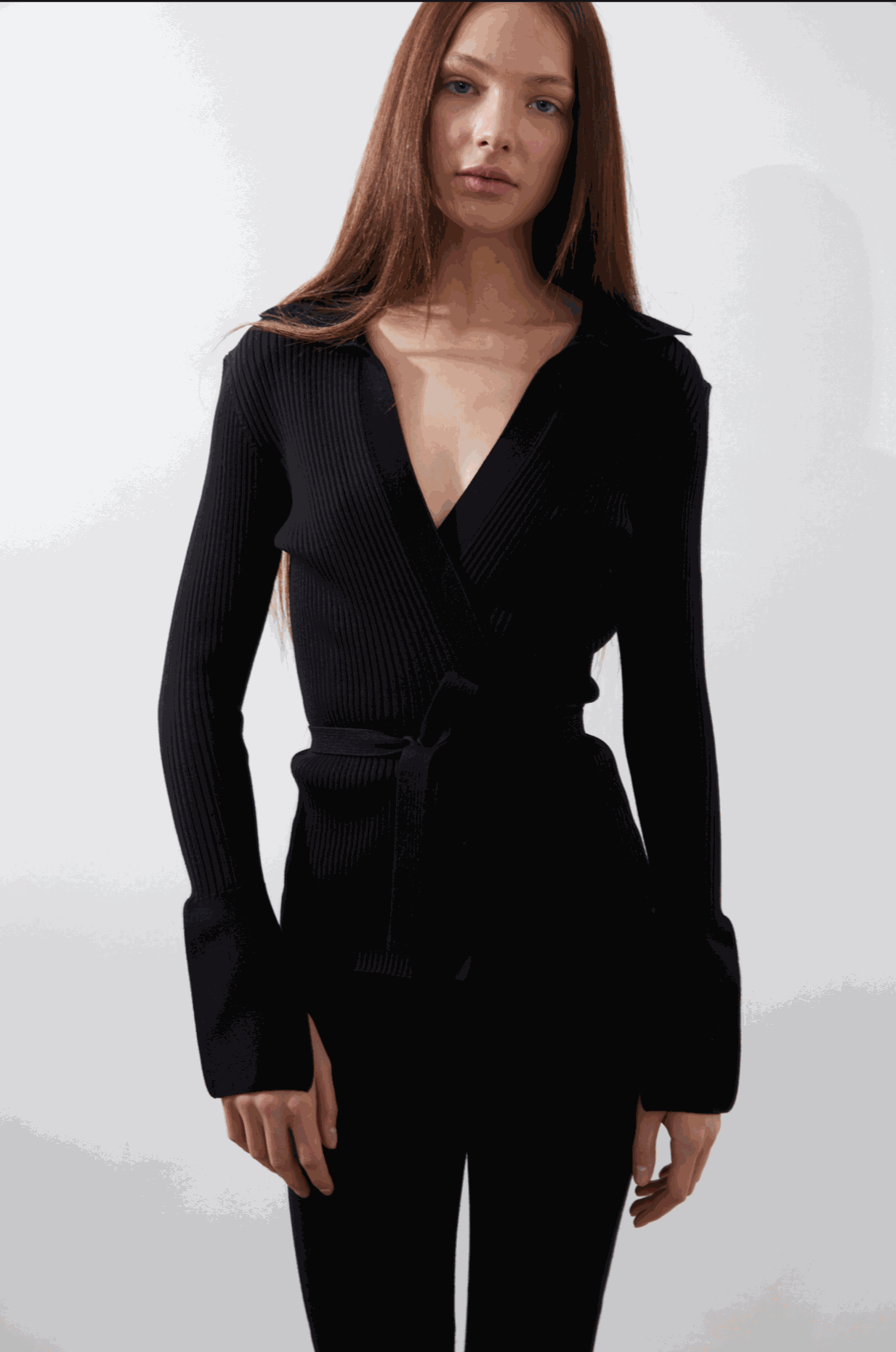 Elios Cardigan in black with waist tie and bell cuffs.