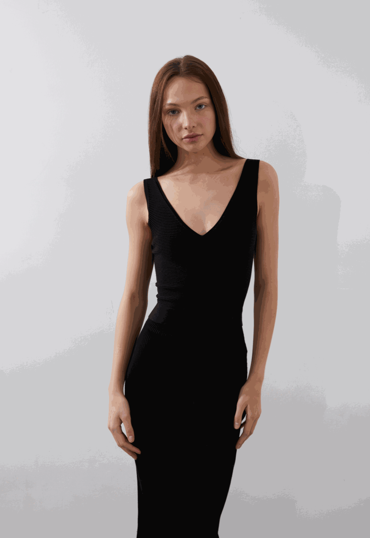 Nova Tank in black, featuring seamless construction and body-contouring ribbing.