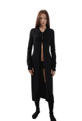 Camael Cardigan in black, featuring long sleeves, button-up design, structured pockets, and cuffed sleeves with thumbholes.