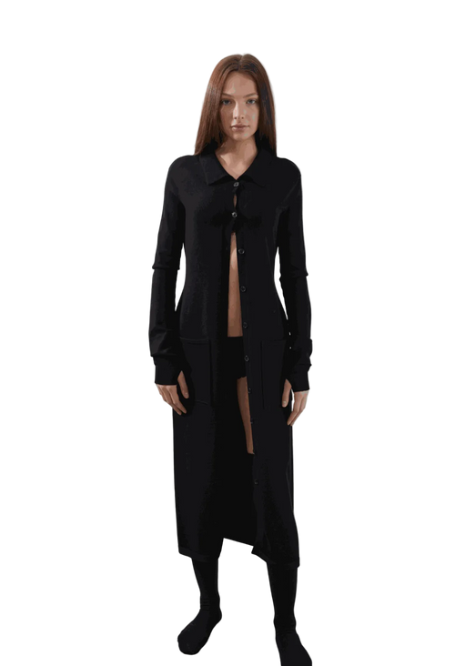 Camael Cardigan in black, featuring long sleeves, button-up design, structured pockets, and cuffed sleeves with thumbholes.