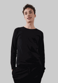 Black Sol Crewneck with full-length sleeves, worn by model standing against a white background.