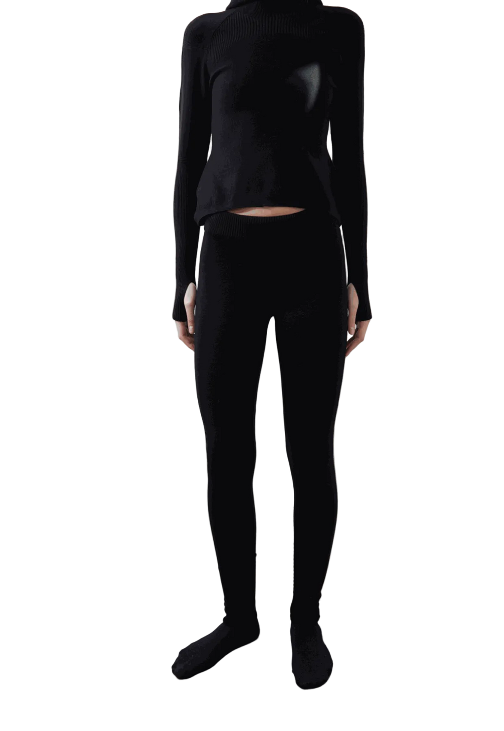 Arca Legging in black worn with matching top, showcasing a seamless and sleek design.