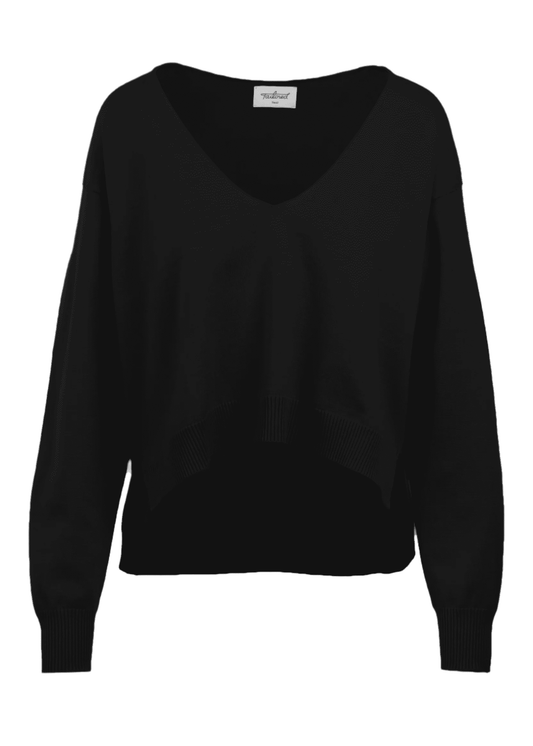 Misa Pullover in black with a high-low bodice, V neckline, and ribbed trim.